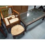 2 chairs and glass coffee table