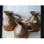 3 x Antique copper jugs