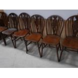 6 Wheel back dining chairs