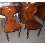 Pair of mahogany Victorian hall chairs