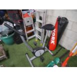 Exercise bike and punch bag