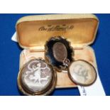Three antique brooches and a Black Cat cigarettes case