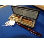 Boxed set of three parker pens and one other