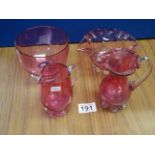 Four items of Cranberry glass