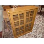 Glass fronted beech bookcase