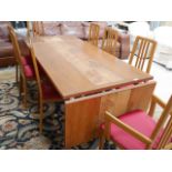 Teak dining table and 8 chairs