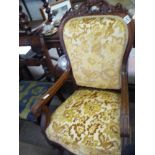 Mahogany armchair with carved detail