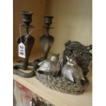 Pair of metallic snake candlesticks, bird basket and horse shoe