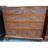 Carved oak chest