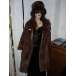 Ladies fur coat and hat
