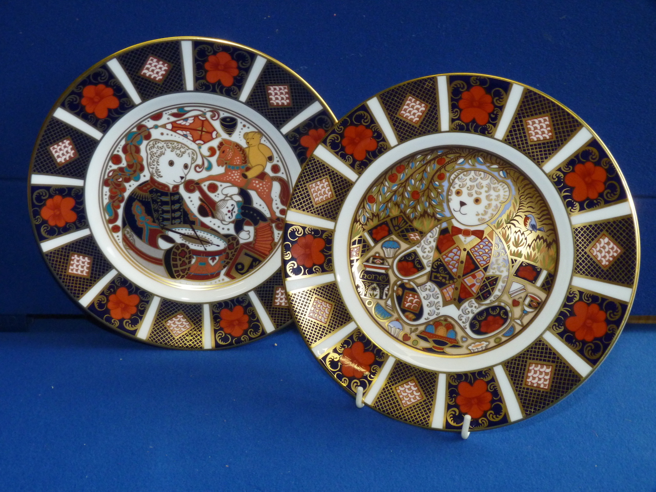 Pair of Royal Crown Derby "Teddys picnic" and "Drummer " plates