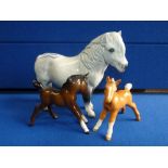 Beswick horse and two Beswick foals