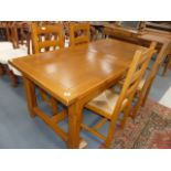 Repro. Light oak dining table and 4 chairs