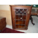 Antique oak glazed corner cupboard