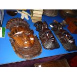 Trio of carved African wall masks