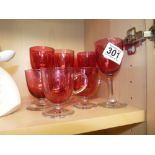 Set of cranberry glass sherry glasses