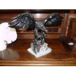 Eagle on plinth