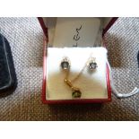 Gold topaz and diamond earrings and pendant set