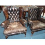 2 leather arm chairs