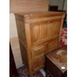 Oak drinks cupboard with linen fold décor