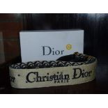 Dior bag strap with metal decoration
