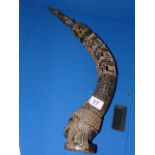 A pair of 19th Century Benin bronze horn figures
