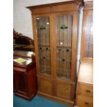 Oak leaded light bookcase