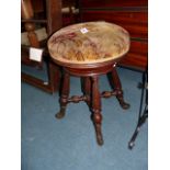 Antique mahogany revolving music stool