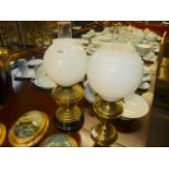 Pair of brass oil lamps with shades