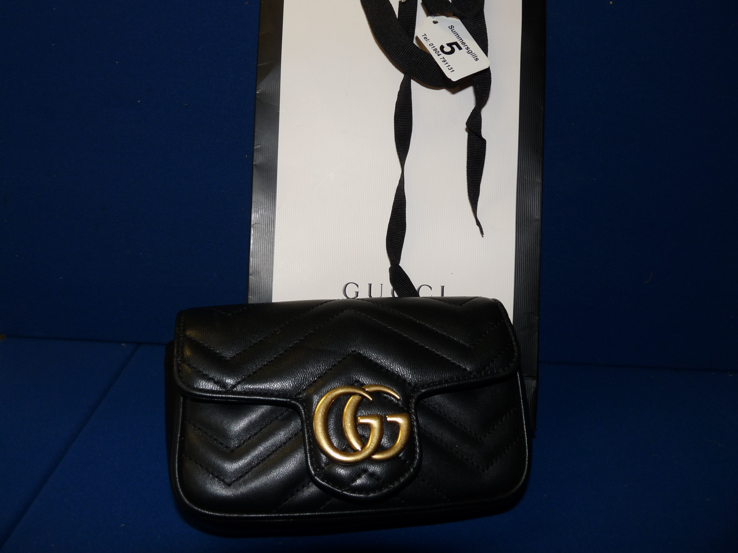 Gucci Marmont Super mini bag in Black Calf skin leather H 4" x 6.5" x d 1.75" Pre owned grade A-