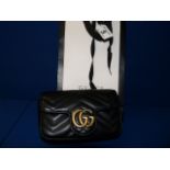 Gucci Marmont Super mini bag in Black Calf skin leather H 4" x 6.5" x d 1.75" Pre owned grade A-