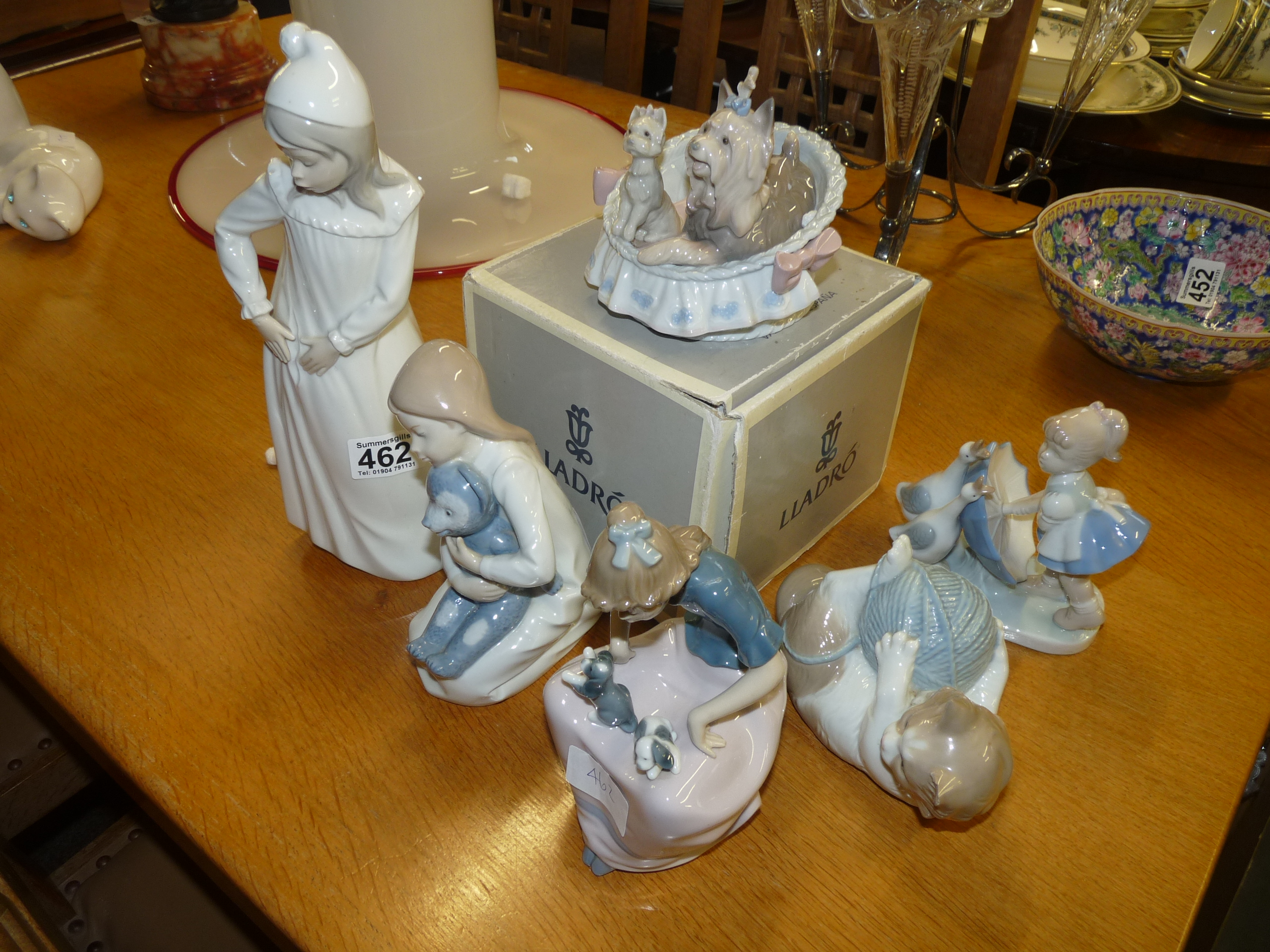 Set of six lladro and Nao figures