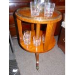 Antique fruitwood revolving table