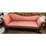 A REGENCY PERIOD FAUX ROSEWOOD AND FLORAL INLAID SCROLL END SETTEE/DAYBED In pink floral fabric,