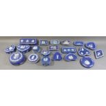 A COLLECTION OF TWELVE 19TH CENTURY WEDGWOOD TRINKET BOXES Dark blue grounds, applied with classical
