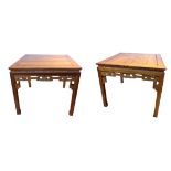 A PAIR OF CHINESE HARDWOOD (POSSIBLY HUANGHUALI) SQUARE TOP TABLES With pierced and carved frieze,