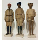 JADUNATH PAL,1821 - 1920, A COLLECTION OF THREE 19TH CENTURY INDIAN CARVED CLAY FIGURINES Soldiers
