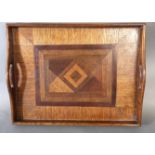 FOUR ANTIQUE AND LATER SERVING TRAYS To include an oak tray with parquetry decoration and a mahogany