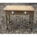 A VICTORIAN PINE SIDE TABLE With a single drawer, on turned legs. (91cm x 71cm x 56cm)