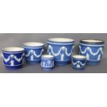 A COLLECTION OF SEVEN VICTORIAN AND LATER WEDGWOOD JASPERWARE JARDINIÈRES Dark blue grounds, applied