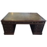 A LARGE 19TH CENTURY MAHOGANY TWIN PEDESTAL DESK With green tooled leather writing surface above