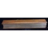 AN ANTIQUE SOUTHERN ASIAN PALM LEAF BOOK Hand written Patra Hindu text in Sanskrit, held in two