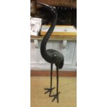 A LIFE SIZE BRONZE STATUE OF A CRANE. (153cm)