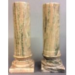 A PAIR OF ITALIAN MARBLE COLUMNS Pink marble with green veins, classical cylindrical form with