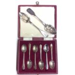 A 20TH CENTURY CASED SET OF SILVER TEASPOONS Scrolled design to handle, hallmarked Sheffield,