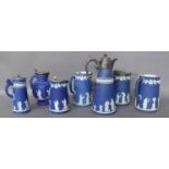 A COLLECTION OF VICTORIAN AND LATER WEDGWOOD JASPERWARE ITEMS To include claret jug with silver