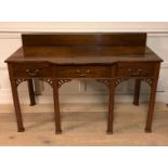 A MAHOGANY CHINESE CHIPPENDALE DESIGN SERVING TABLE The shaped top over three drawers with brass