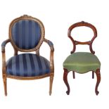 A FRENCH SPOONBACK OPEN ARMCHAIR Along with a Victorian walnut balloon chair.