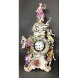 A 19TH CENTURY MEISSEN ARMORIAL CLOCK Elaborately figured with semiclad females, cherubs, mythical