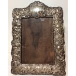 AN ART NOUVEAU SILVER RECTANGULAR EASEL PHOTOGRAPH FRAME With intertwined pierced floral